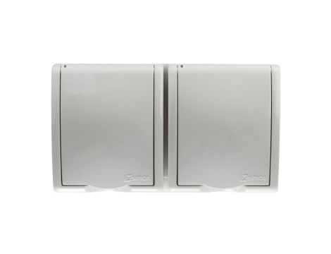 Simon Aquarius Gniazdo hermetyczne podwójne z/u IP54 z przesłoną torów i klapką pełną białe AQGZ1-2z/11